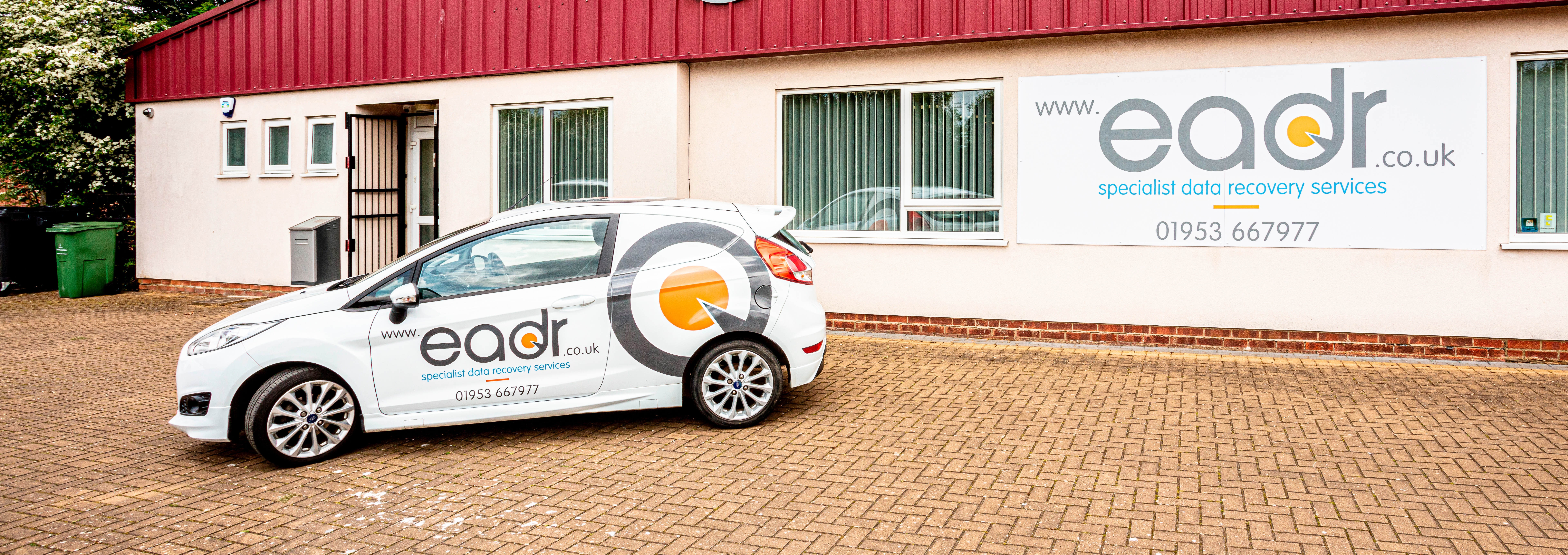 EADR liveried van and building